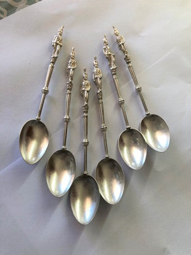 Set of six elegant sterling silver spoons featuring detailed Guards Head handles, showcasing Victorian craftsmanship.
