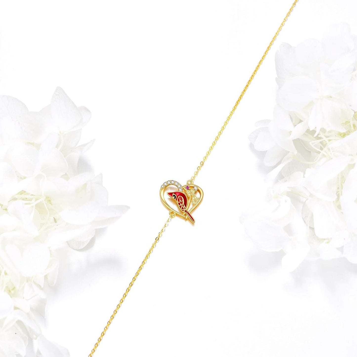 Pulsera con dije de corazón cardenal de oro de 14 quilates