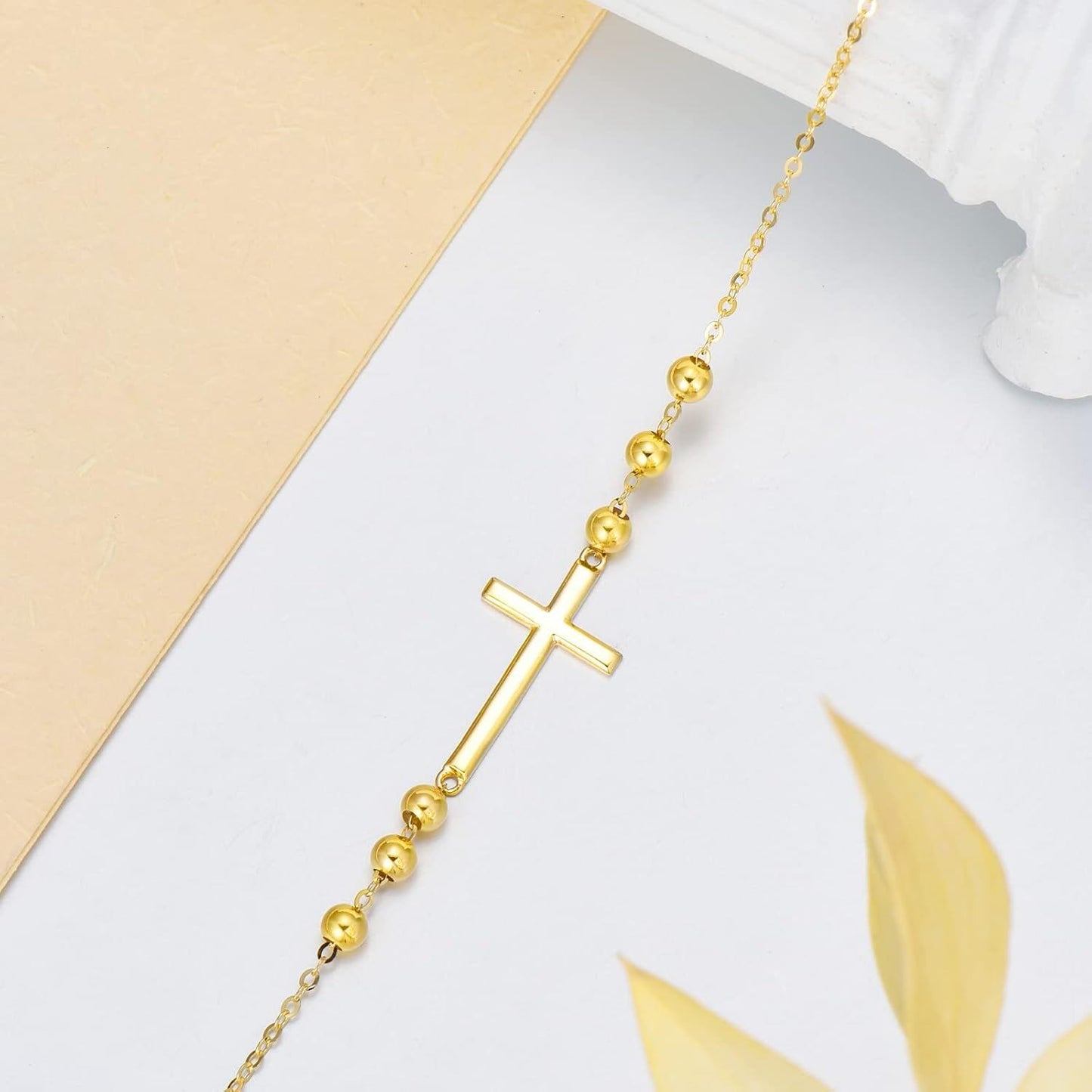 Pulsera de cadena de cuentas con cruz lateral de oro de 14 quilates