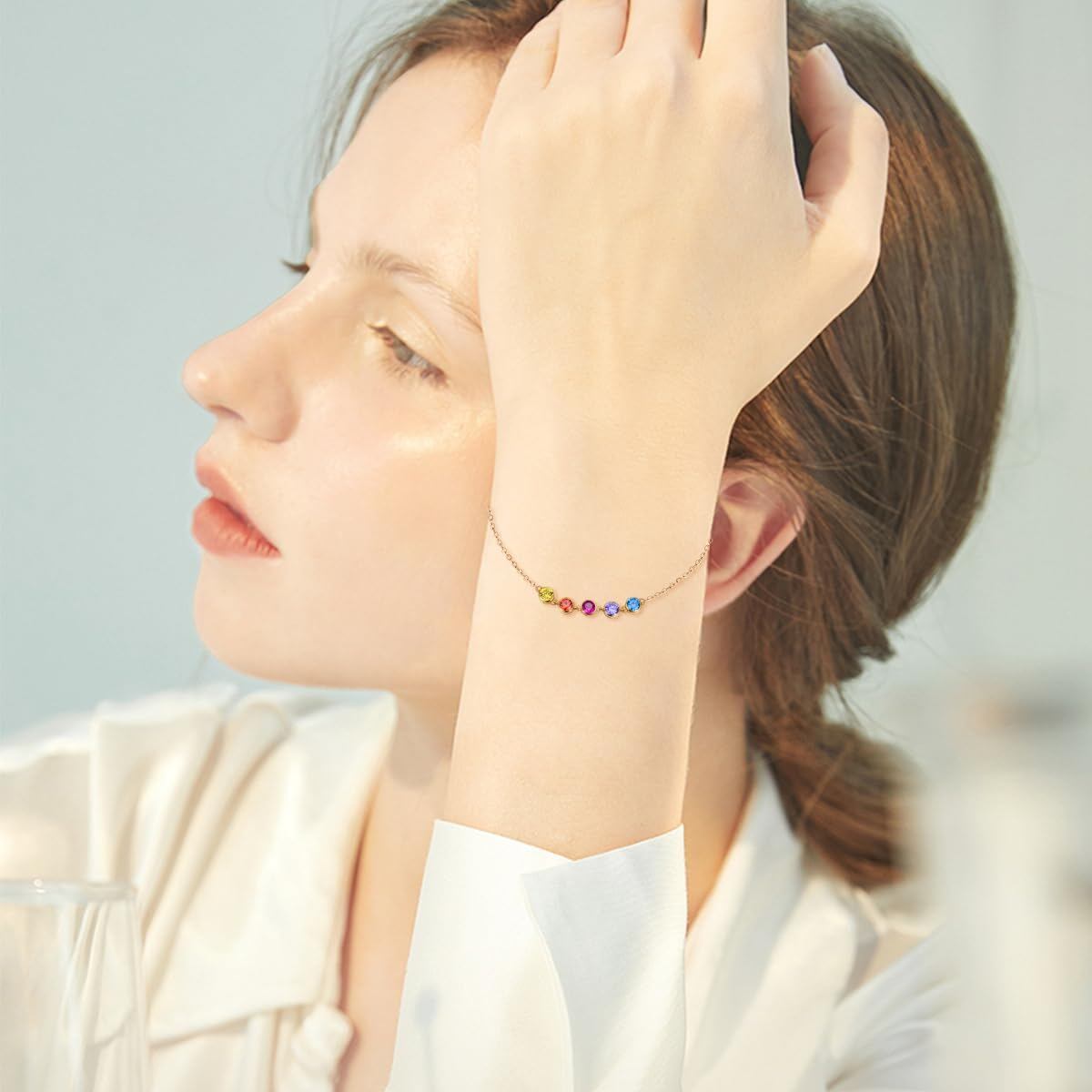 Pulsera de los chakras con circonita cúbica 5A y oro amarillo de 14 quilates.