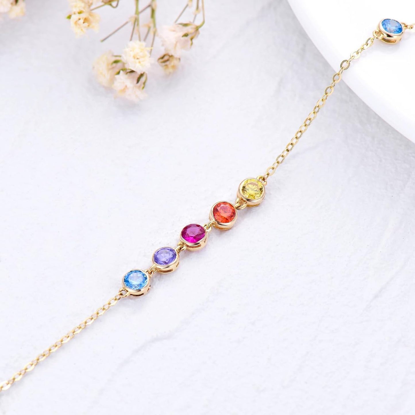 Pulsera de los chakras con circonita cúbica 5A y oro amarillo de 14 quilates.