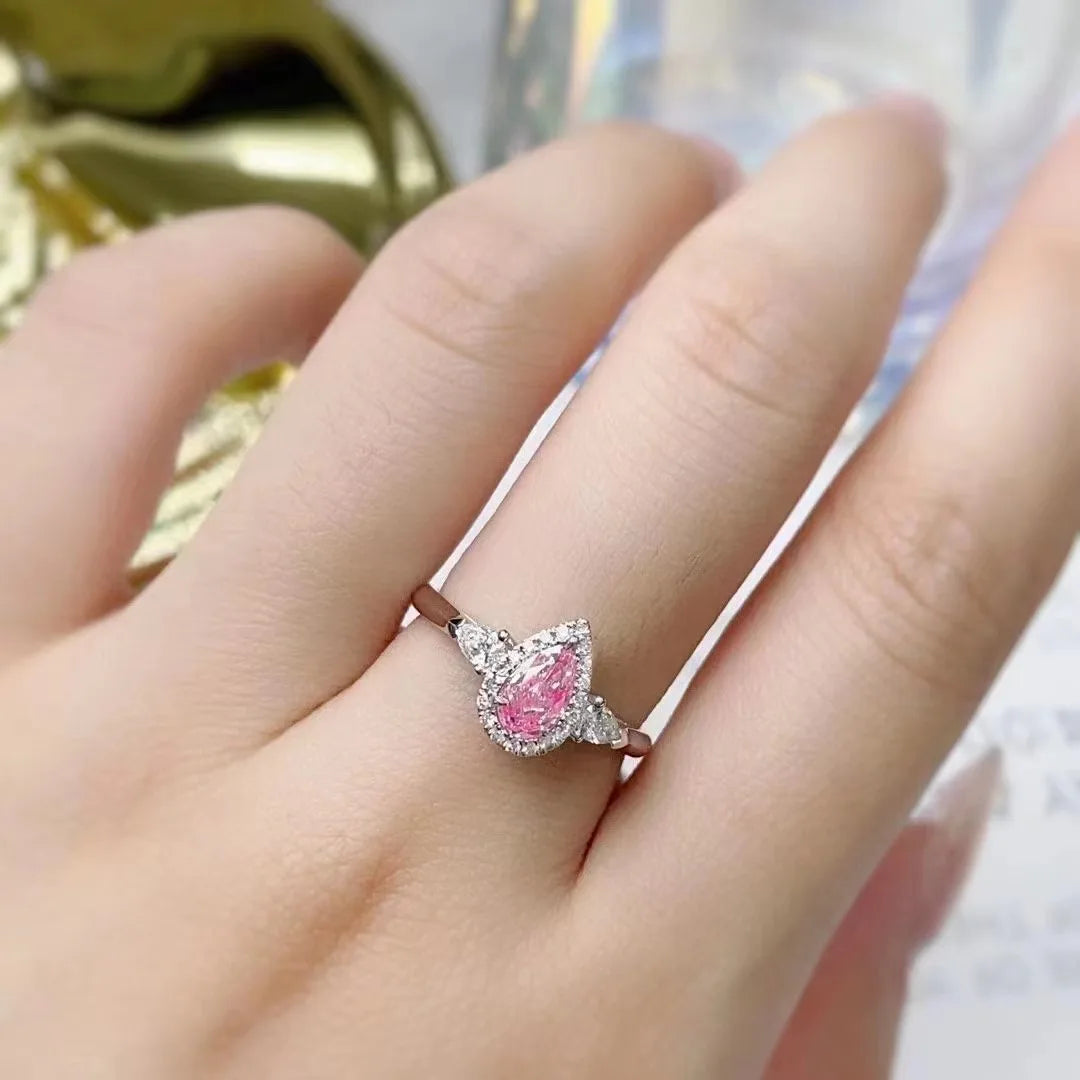 Fancy Pink Diamond Ring 0.55ct Pear Shaped 18K White Gold Three Stone