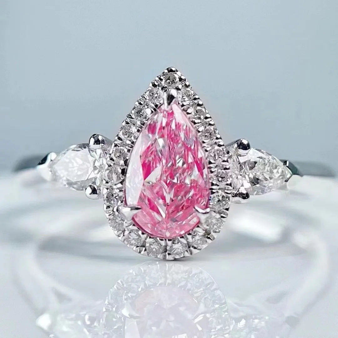 Fancy Pink Diamond Ring 0.55ct Pear Shaped 18K White Gold Three Stone