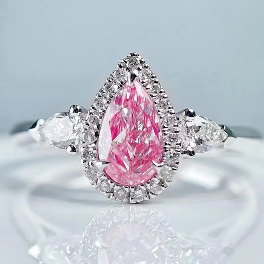 Fancy Pink Diamond Ring 0.55ct Pear Shaped 18K White Gold Three Stone