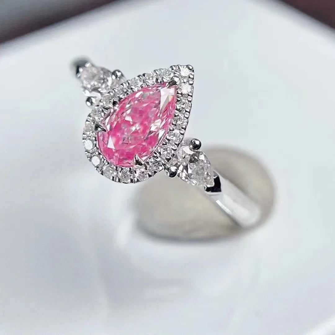 Fancy Pink Diamond Ring 0.55ct Pear Shaped 18K White Gold Three Stone