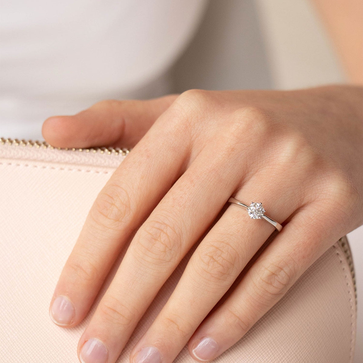 Diamond solitaire ring with 0.70ct diamond in 9K white gold — view 2