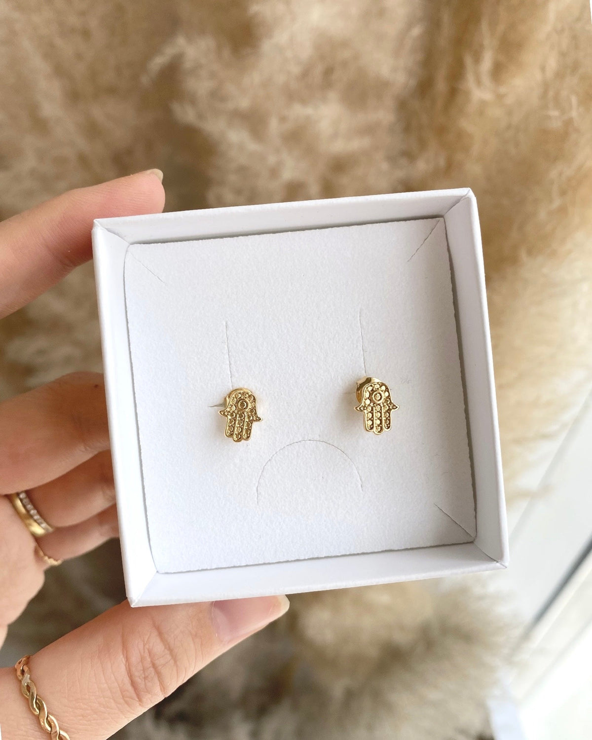 Hamsa stud earrings