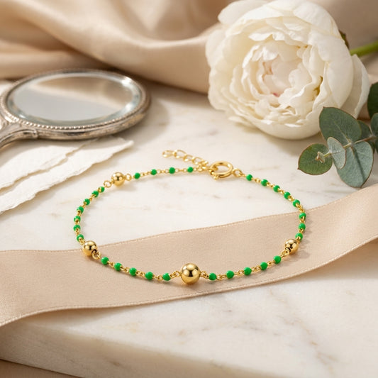 Sterling Silver Beaded Bracelet with Light Green Details