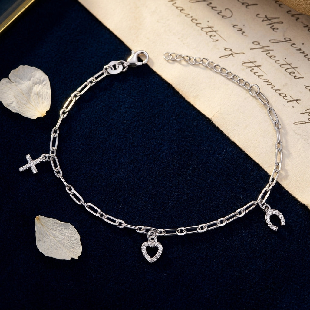 Sterling Silver CZ Charm Bracelet with Cross, Heart & Horseshoe