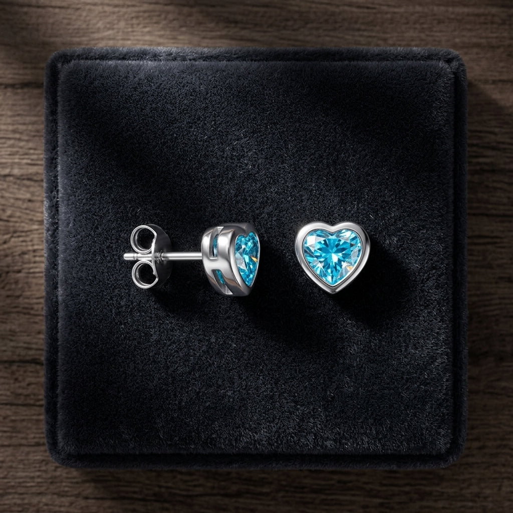 Pendientes con corazón de topacio azul y circonita cúbica